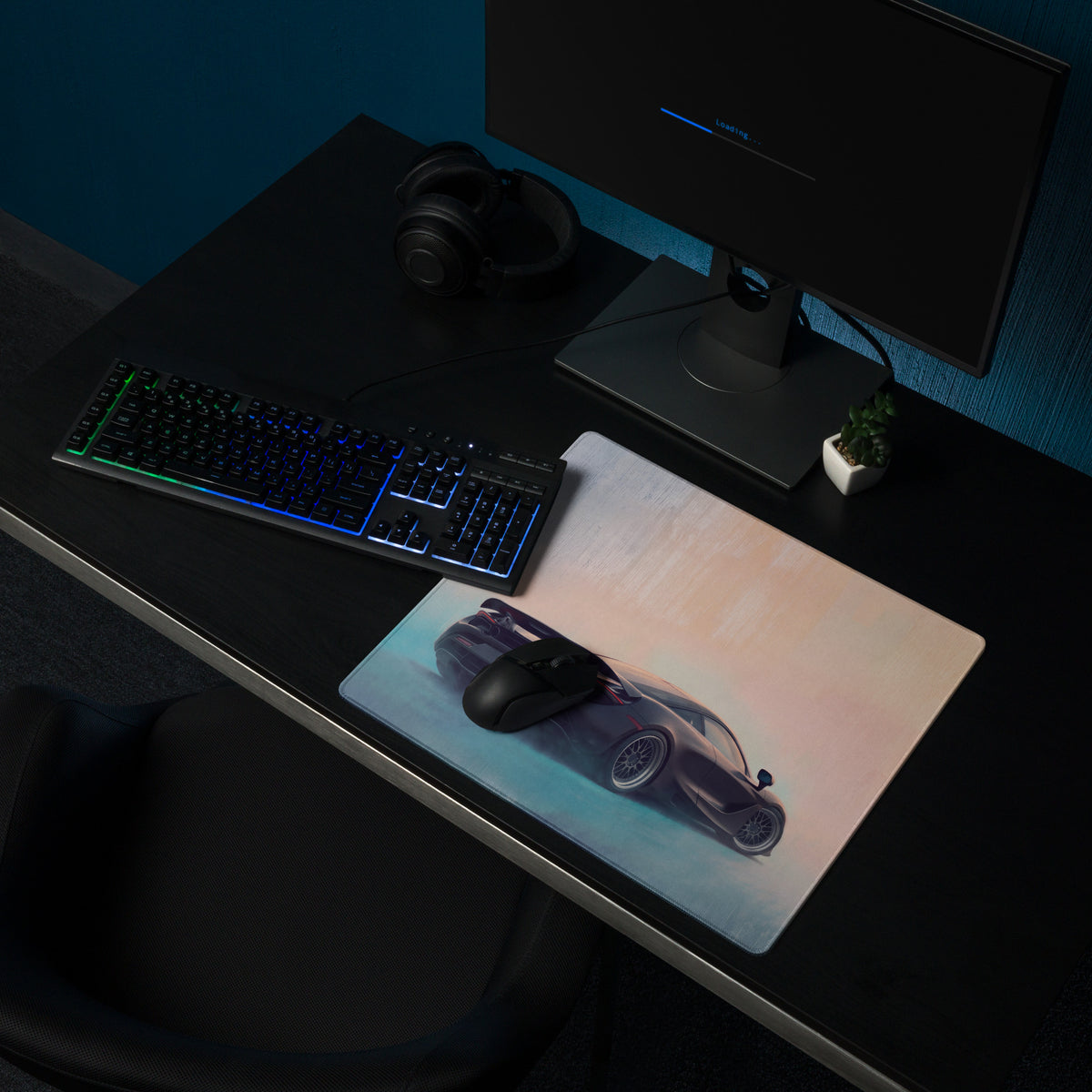 A sleek black gaming mouse on a mclaren 720s inspired stealth shadow xl desk mat with purple sports car design