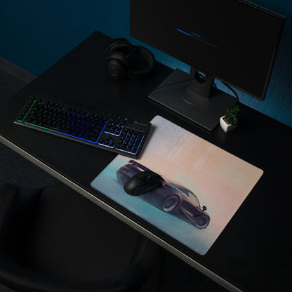 A sleek black gaming mouse on a mclaren 720s inspired stealth shadow xl desk mat with purple sports car design
