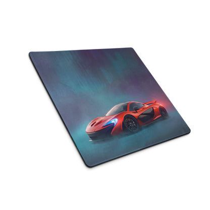 Red McLaren P1 sports car graphic on rectangular volcano red XL gaming mousepad with dark atmospheric background