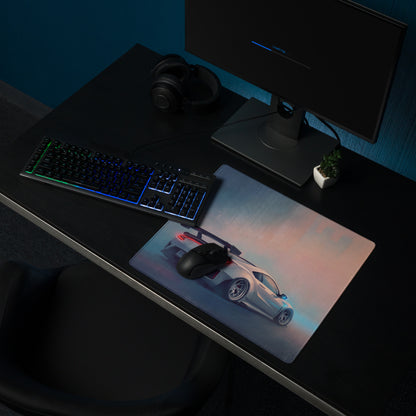 A sleek rectangular non-slip gaming mousepad featuring a white acura nsx widebody with red taillights on a gradient sky background