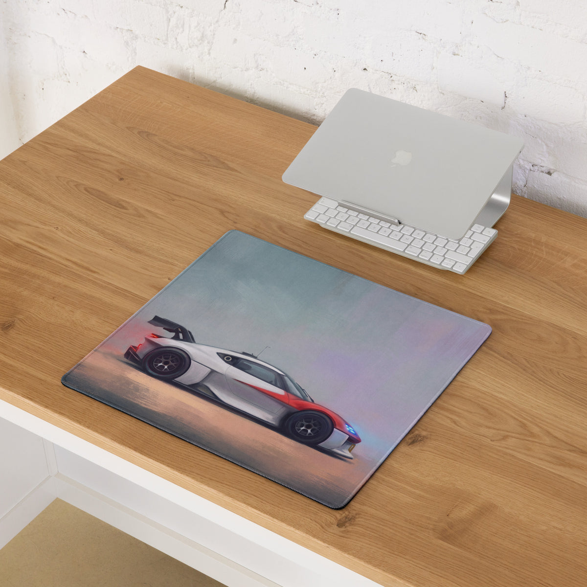 Rectangular low-friction desk mat featuring a white and red Porsche Mission R inspired race car illustration