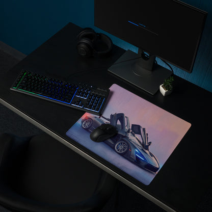 A sleek rectangular low-friction cloth gaming mousepad with a vibrant blue-accented McLaren Senna sports car design