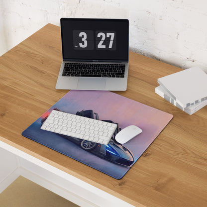 A sleek rectangular cloth mousepad with a vibrant gradient and futuristic blue and black McLaren Senna sports car design
