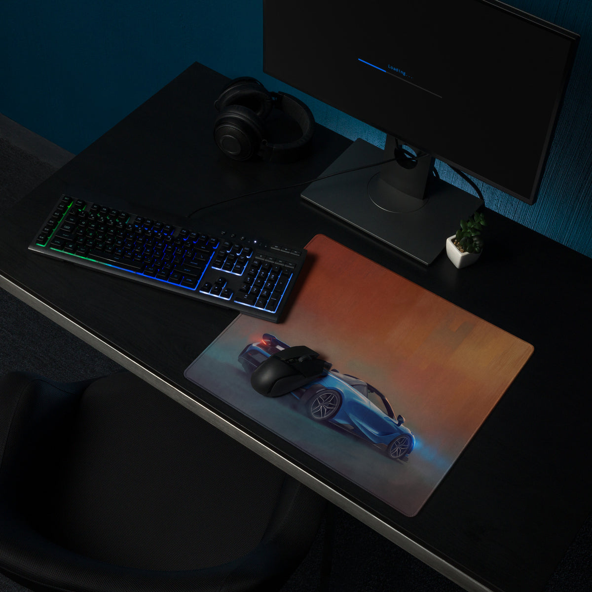 A rectangular high precision xl gaming mousepad with vibrant gradient and blue mclaren 765lt sports car design