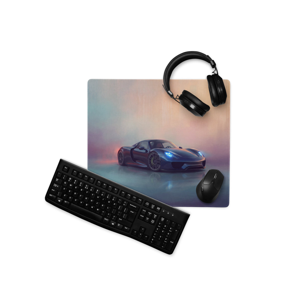 A sleek black non-slip gaming mousepad featuring a vibrant blue Porsche 918 Spyder graphic on a misty background