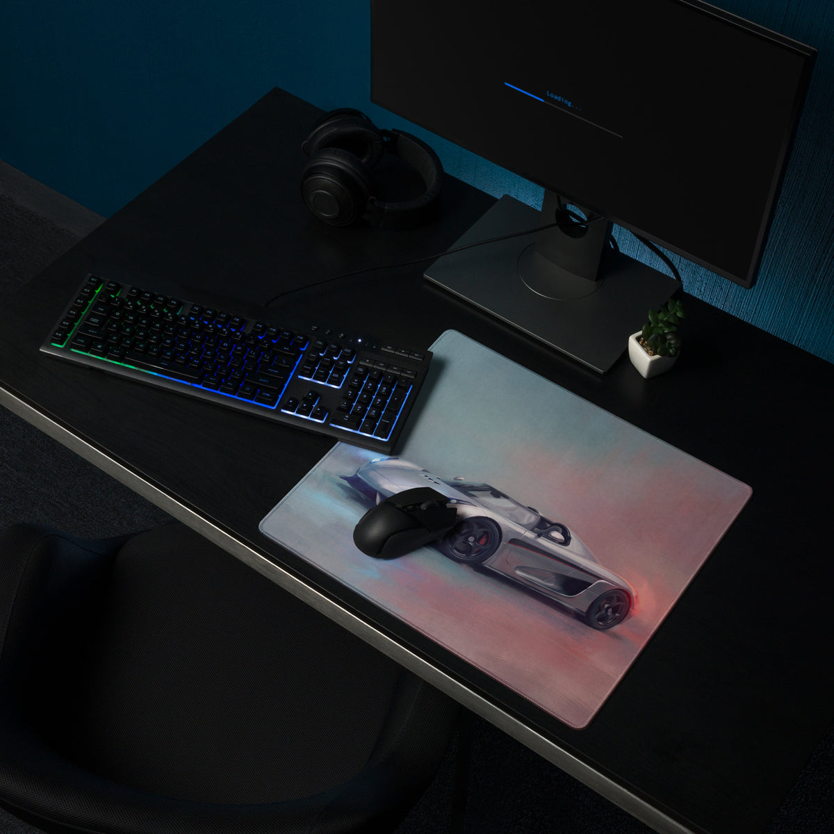Koenigsegg regera inspired silver apex desk mat with vibrant silver sports car graphic and red blue lighting effects