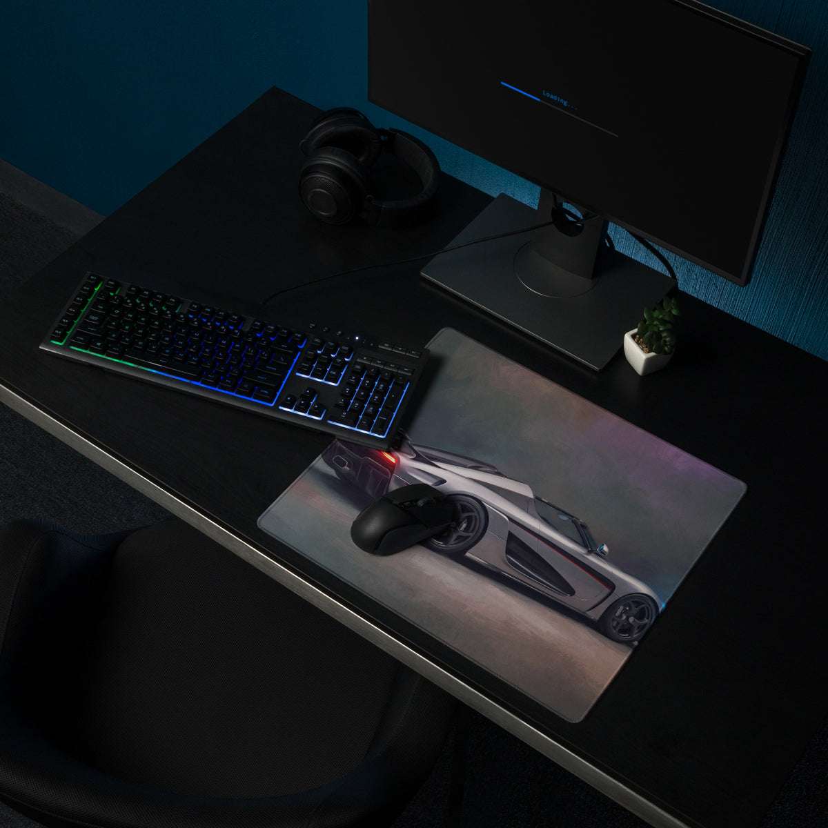 A sleek rectangular high-precision xl gaming mousepad with a silver Koenigsegg Regera inspired apex rear graphic