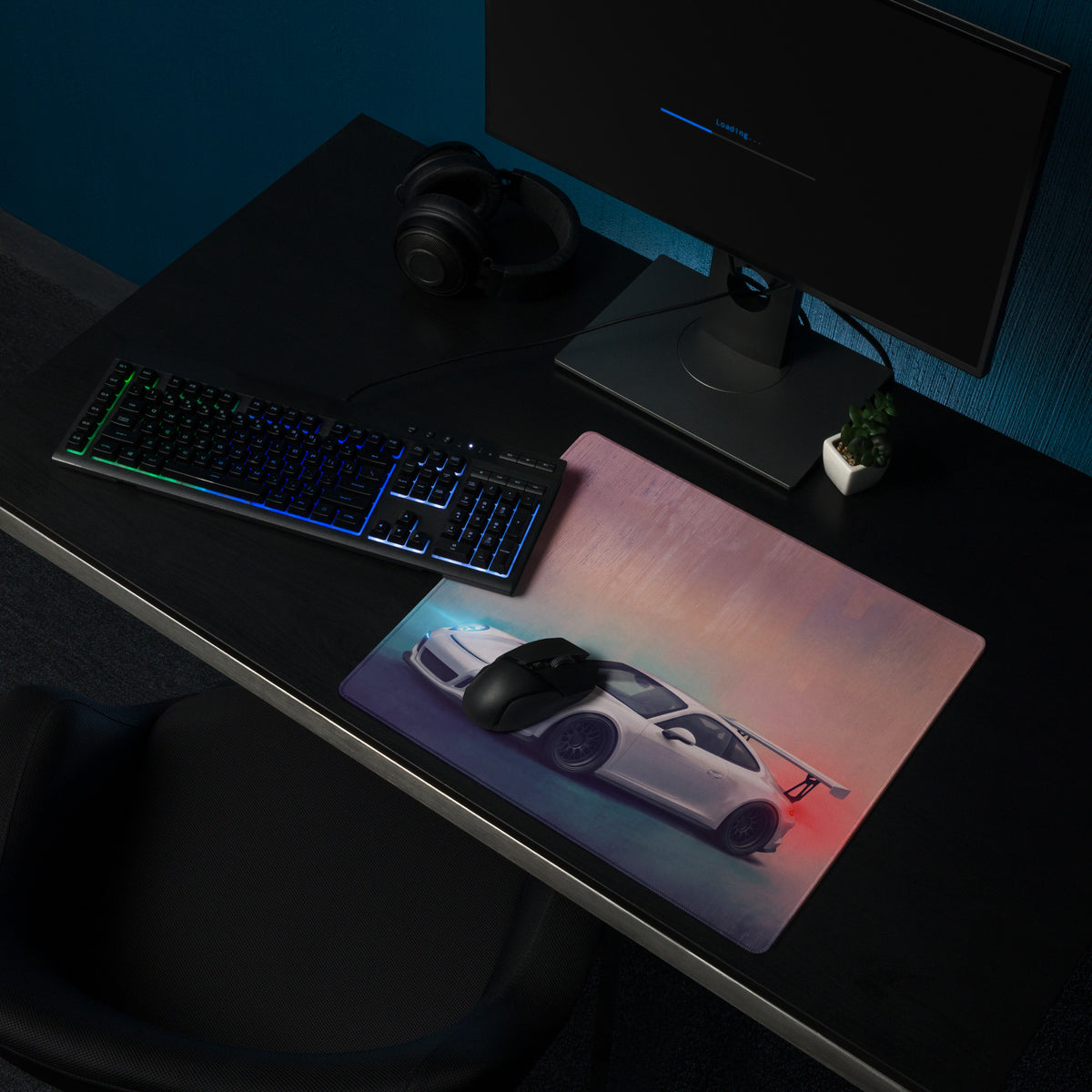 A sleek rectangular ultra-glide gaming mousepad with stitched edges featuring a white Porsche 911 GT3 sports car design