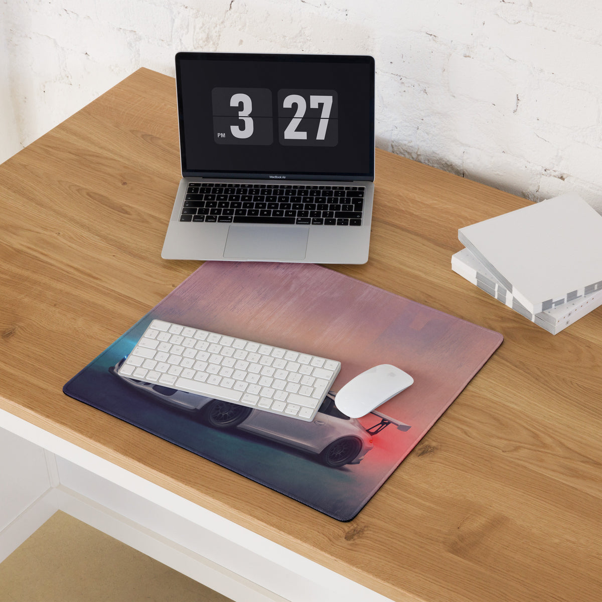 Rectangular pure white stitched edge gaming mousepad with silver Porsche 911 GT3 inspired car print on wooden desk