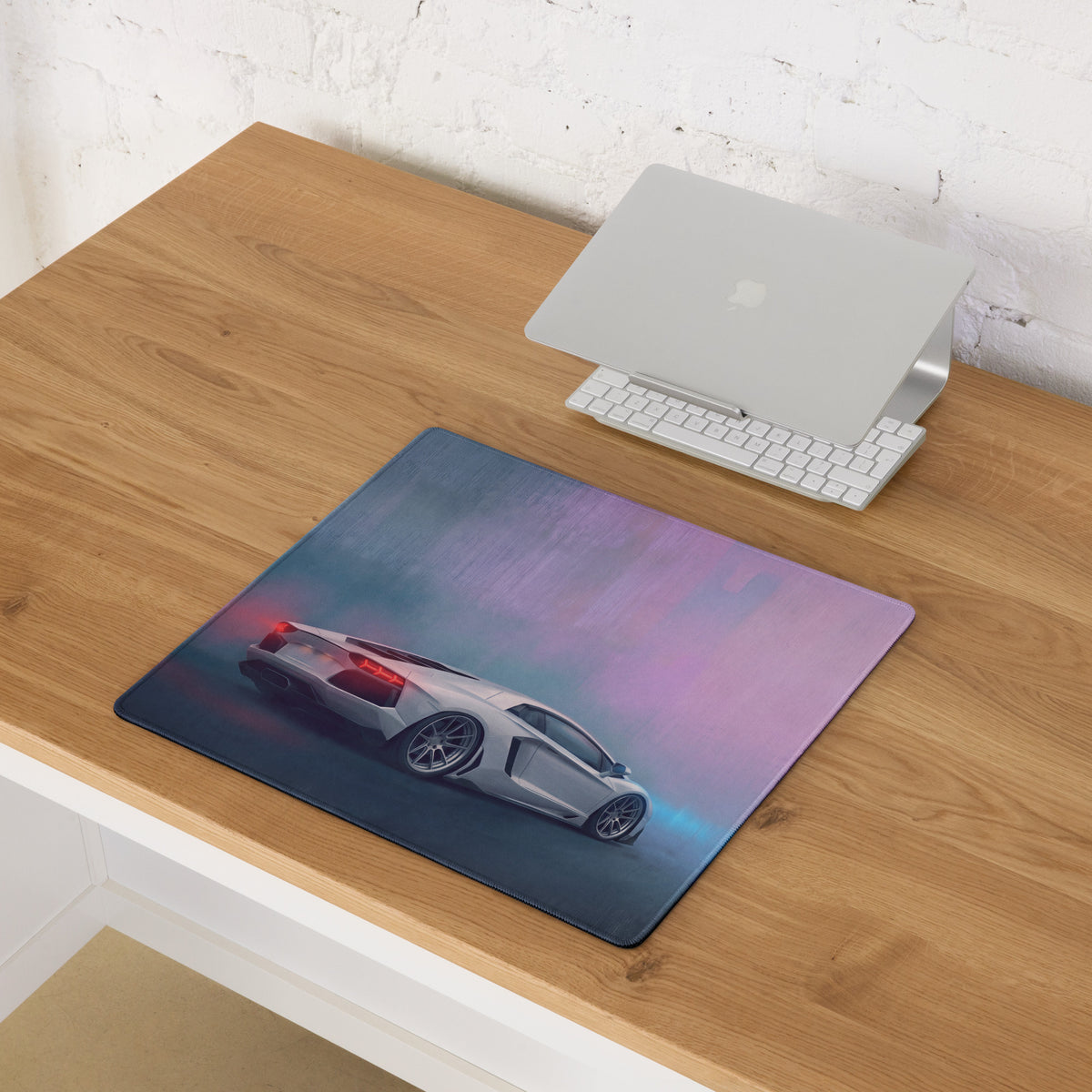 A sleek rectangular high-precision xl gaming mousepad with a vibrant white sports car graphic on a gradient background