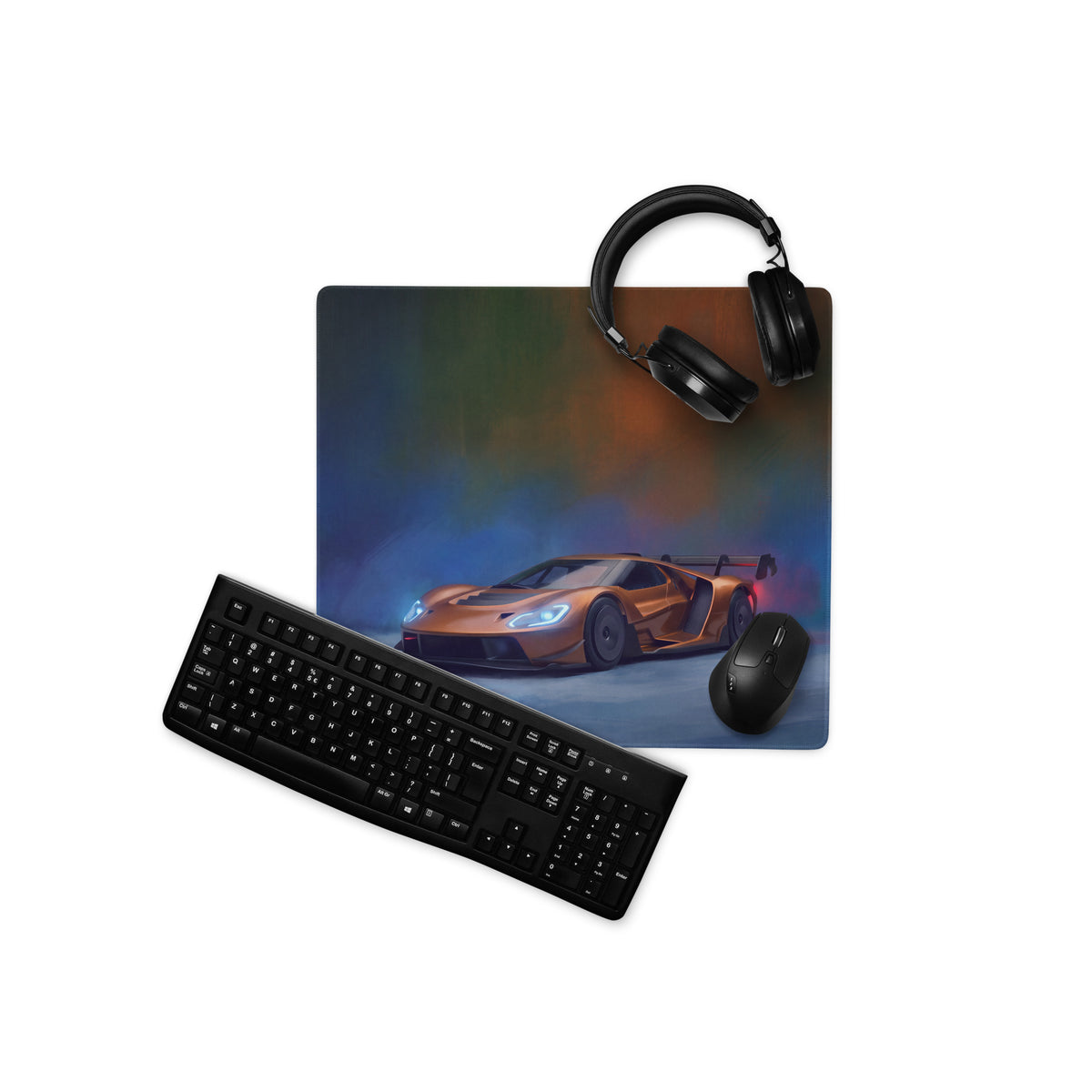 Ford gt inspired copper apex orange sports car graphic desk pad with ultra glide stitched edge mouse mat next to keyboard and headset