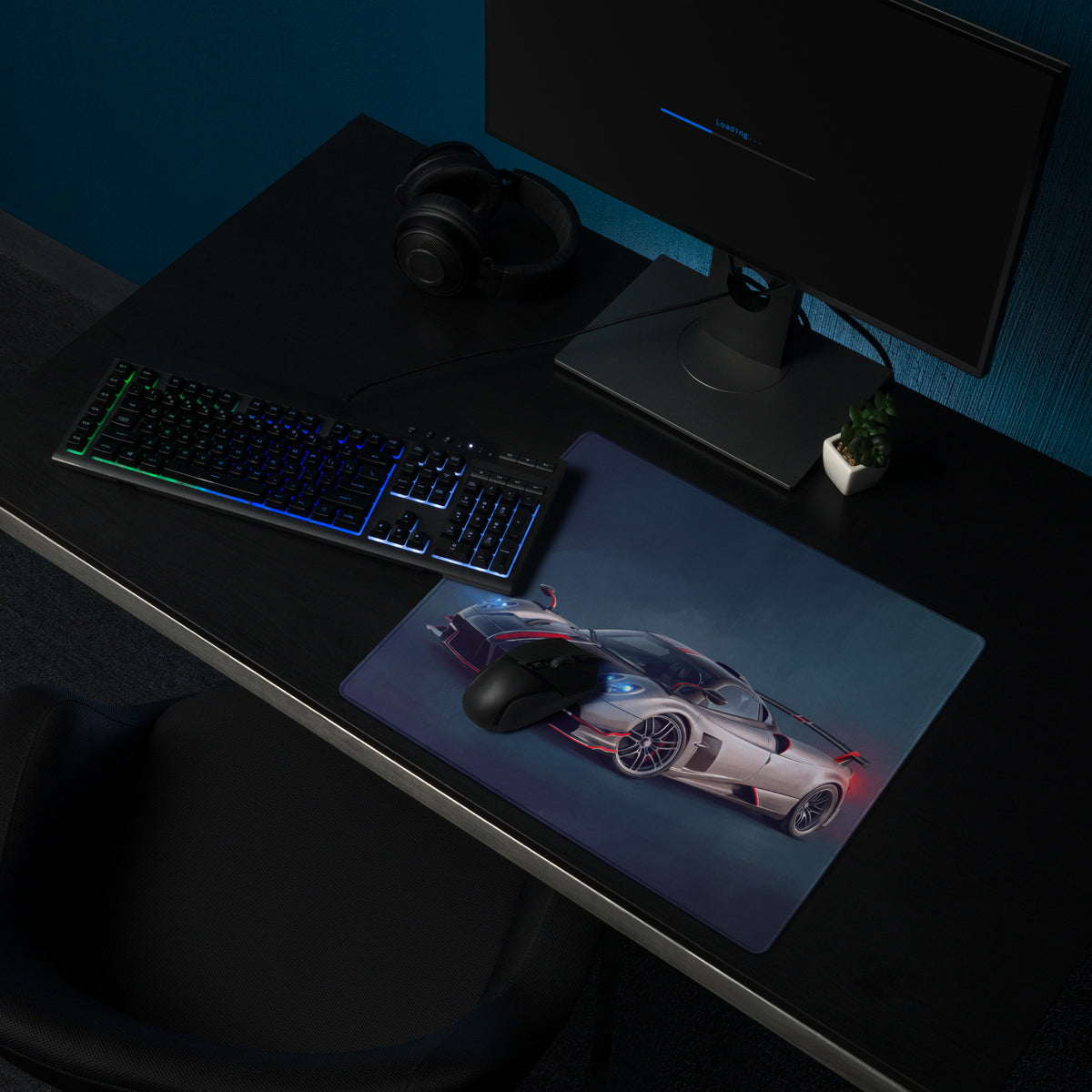 A sleek rectangular low-friction cloth gaming mousepad featuring a silver and black pagani huayra hypercar with red accents