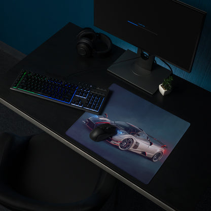 A sleek rectangular low-friction cloth gaming mousepad featuring a silver and black pagani huayra hypercar with red accents