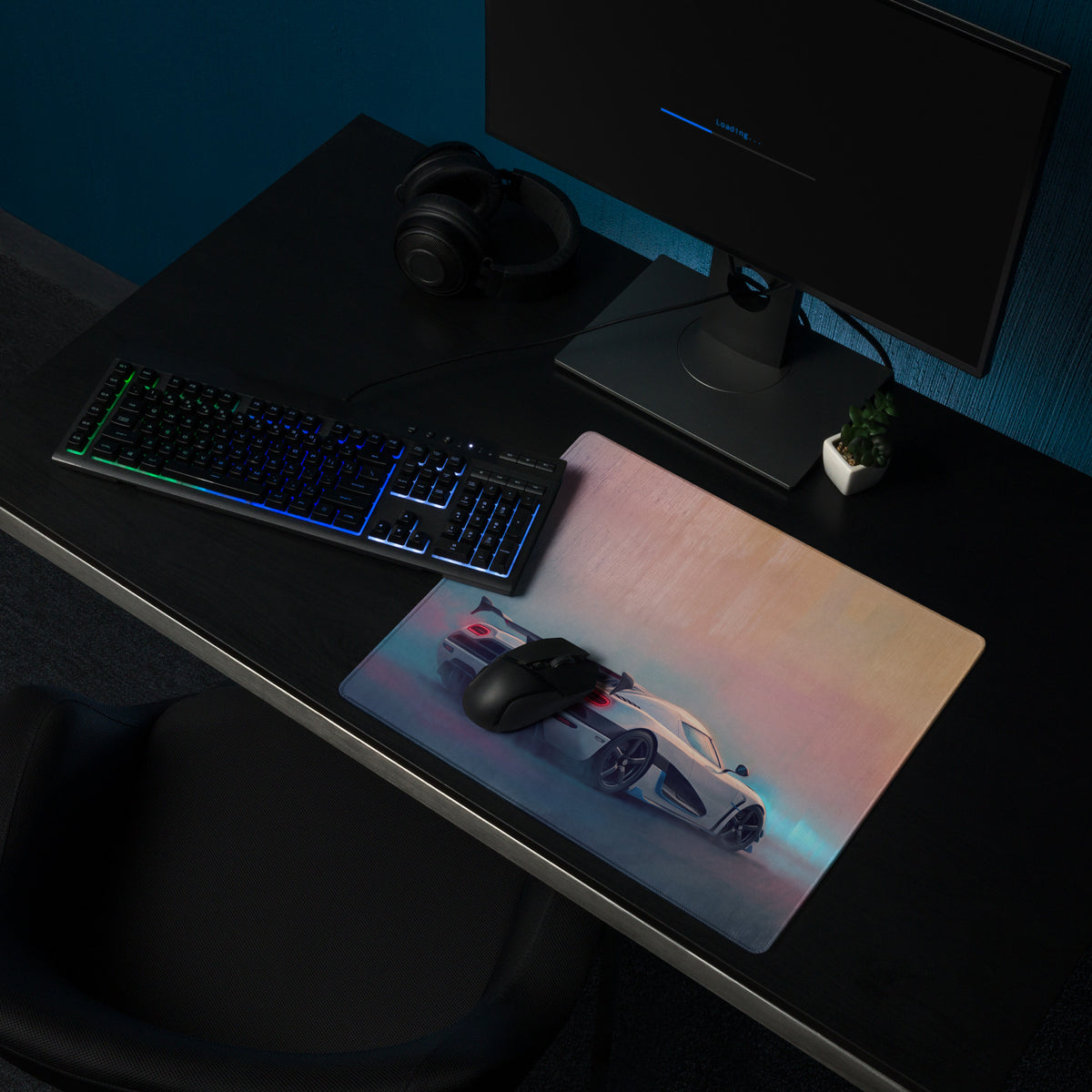 A sleek xl gaming mousepad featuring a vibrant white koenigsegg hypercar graphic with blue and pink accents