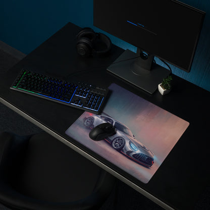 A sleek rectangular gaming mousepad with stitched edges featuring a silver and black Mercedes-AMG GT graphic