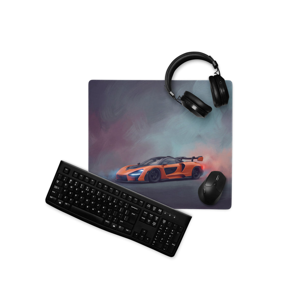 Orange mclaren sports car graphic printed on a rectangular non-slip extended desk pad mouse mat