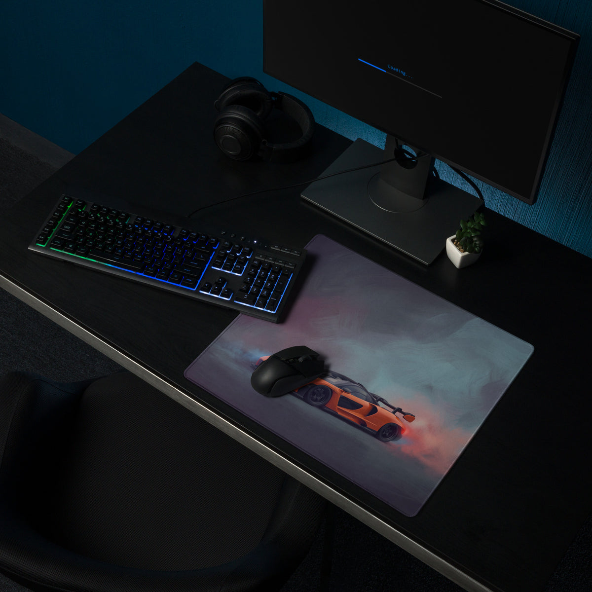 Rectangular non-slip mousepad featuring an orange mclaren senna inspired sports car graphic with smoky gray and pink background