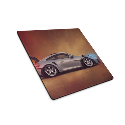 Porsche 911 GT3 RS inspired silver apex desk pad with ultra-glide stitched edge featuring silver Porsche sports car graphic