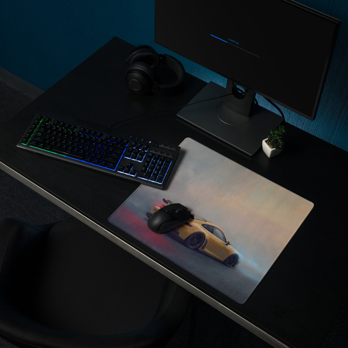 A rectangular high-precision xl gaming mousepad featuring a vibrant yellow porsche 911 gt3 inspired sports car design with red and blue lighting effects