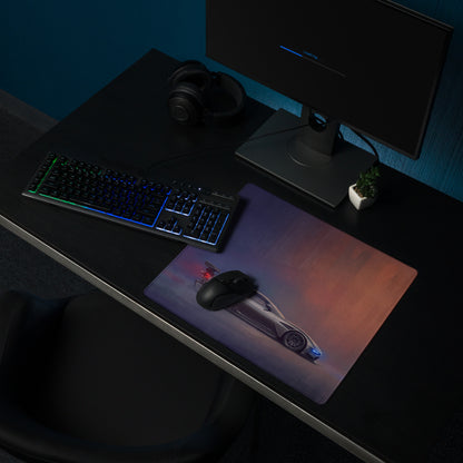 Aston Martin Vulcan inspired charcoal stealth desk pad with ultra-glide stitched edge featuring a futuristic silver sports car graphic
