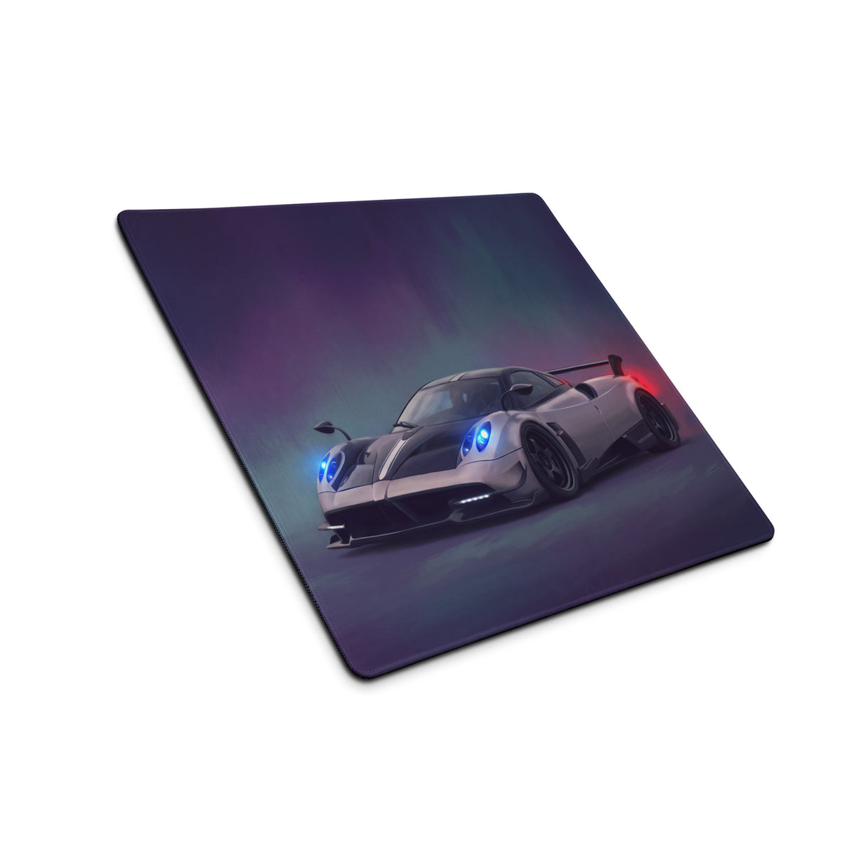 A sleek silver carbon pagani huayra inspired extended non slip desk pad with vibrant digital sports car illustration