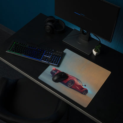 A sleek rectangular low-friction cloth gaming mousepad featuring a vibrant red ferrari laferarri inspired sports car design with blue accents