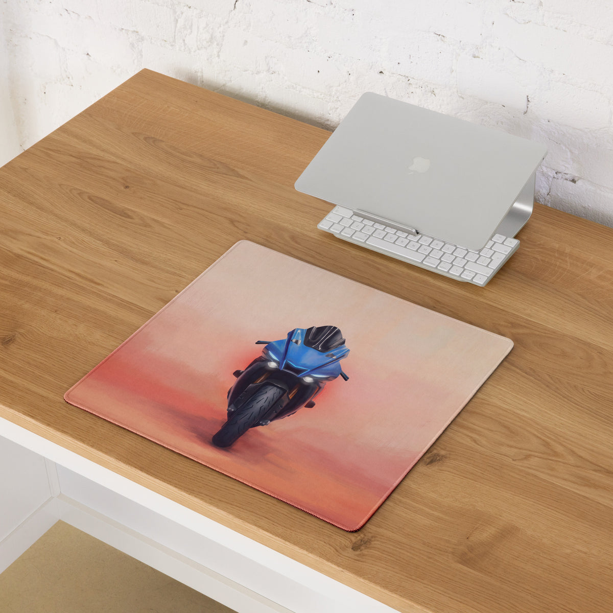 Rectangular yamaha r1 inspired extra large mouse pad with vibrant blue motorcycle on orange pink sunset desk mat