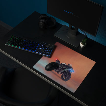A sleek rectangular gaming mousepad with a futuristic motorcycle graphic in blue red on an orange gradient background