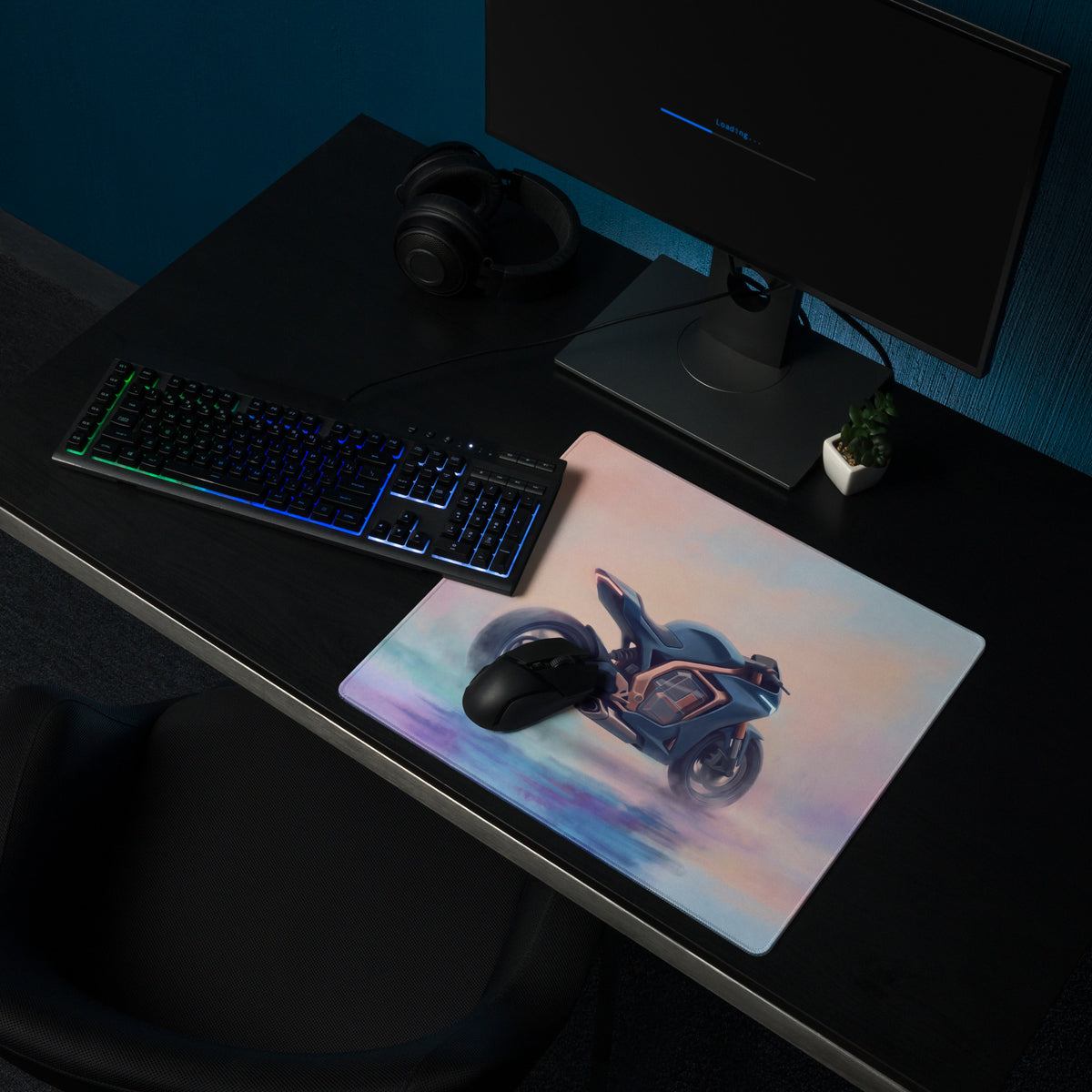 A sleek rectangular gaming mousepad with a vibrant blue futuristic motorcycle design for gamers and office decor