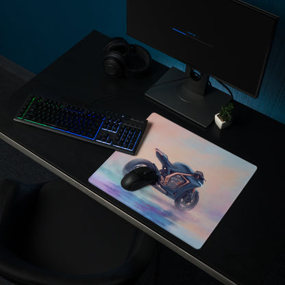 A sleek rectangular gaming mousepad with a vibrant blue futuristic motorcycle design for gamers and office decor