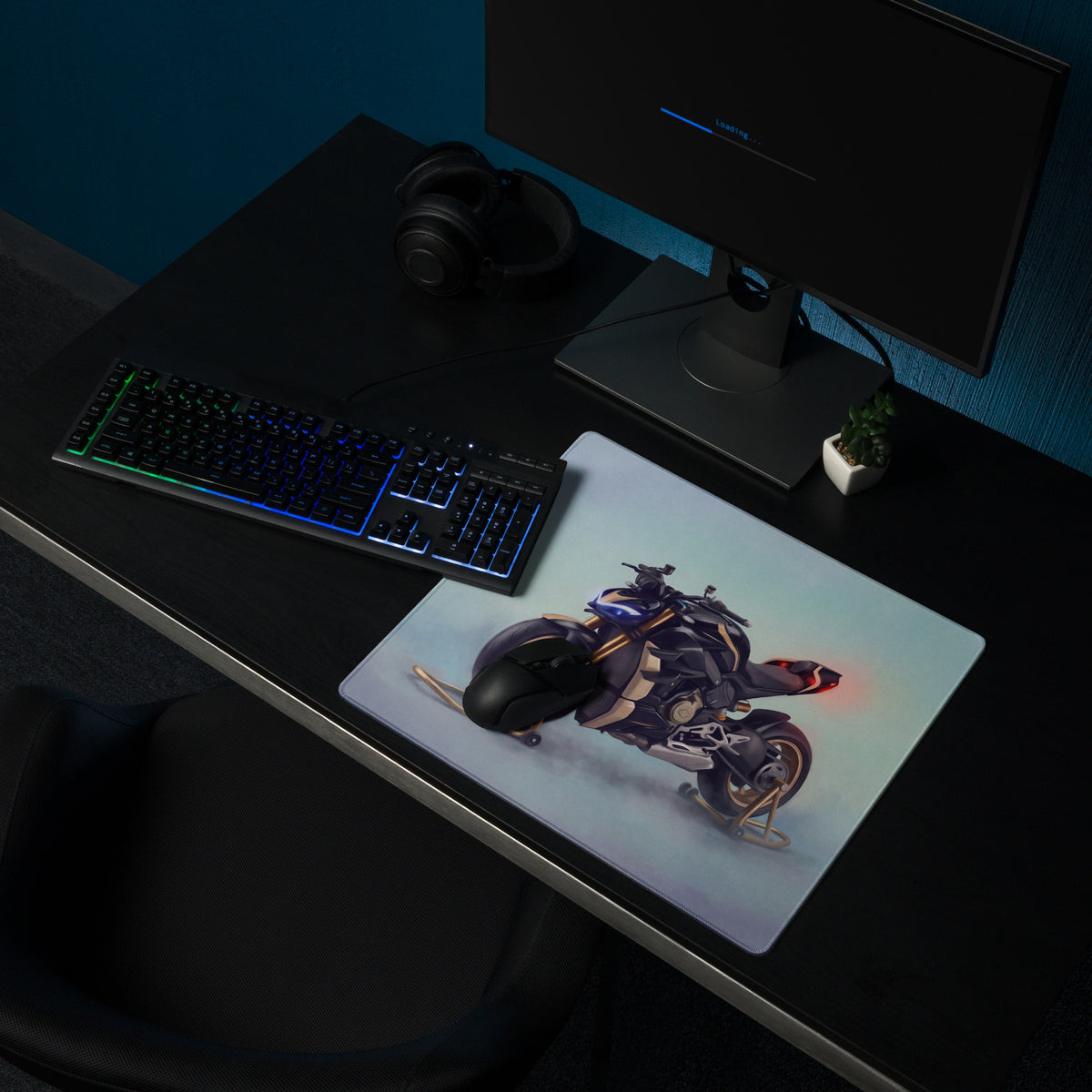 A sleek rectangular ducati streetfighter v4 inspired gaming mousepad with black gold motorcycle and blue glowing headlights