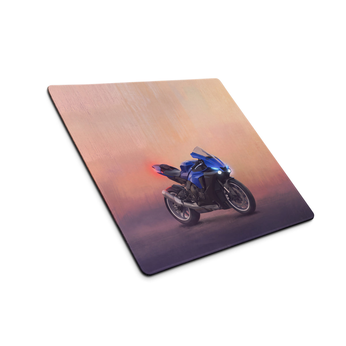 Blue sport motorcycle graphic printed on a rectangular smooth stitched desk mat with a gradient sunset background