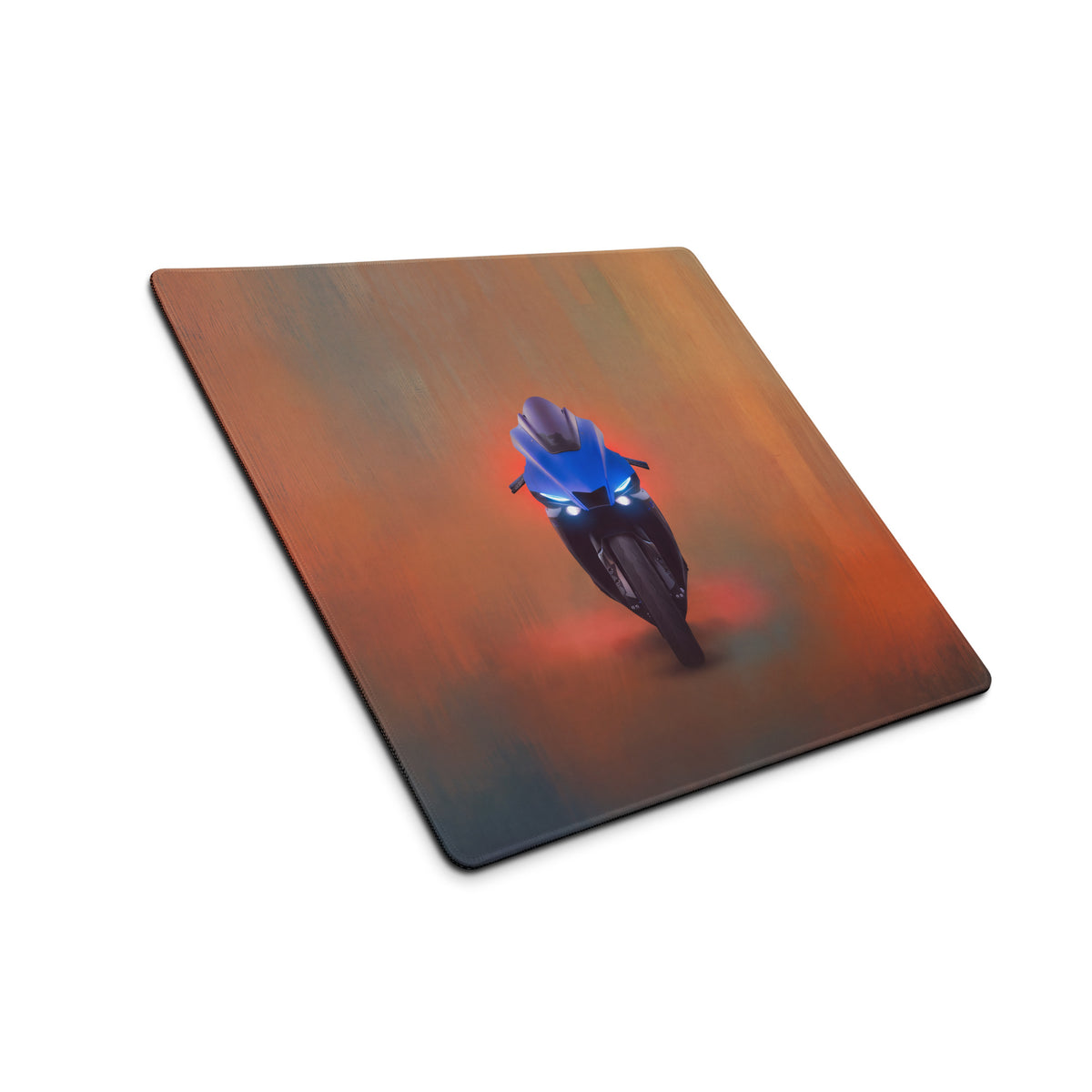 Blue yamaha yzfr1 inspired large gaming mousepad with glowing headlights and sportbike graphic on orange brown background