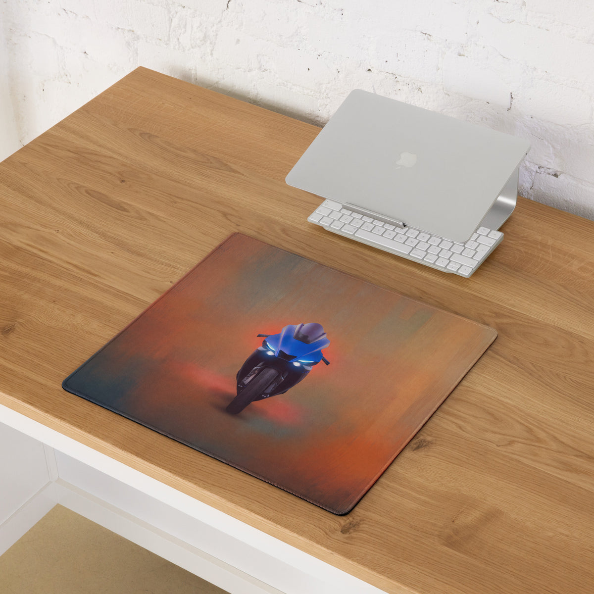 Rectangular Yamaha YZF-R1 inspired gaming mousepad with blue sportbike graphic on orange and red gradient background