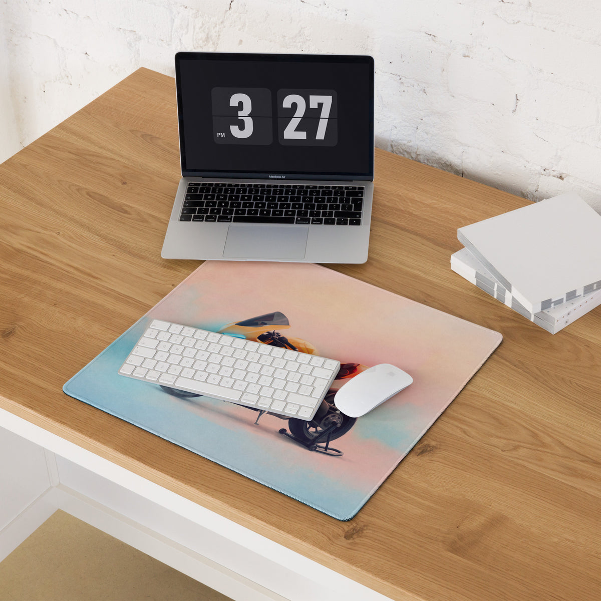 Rectangular yellow Ducati Panigale inspired large gaming desk mat with motorcycle print on soft pink and blue background