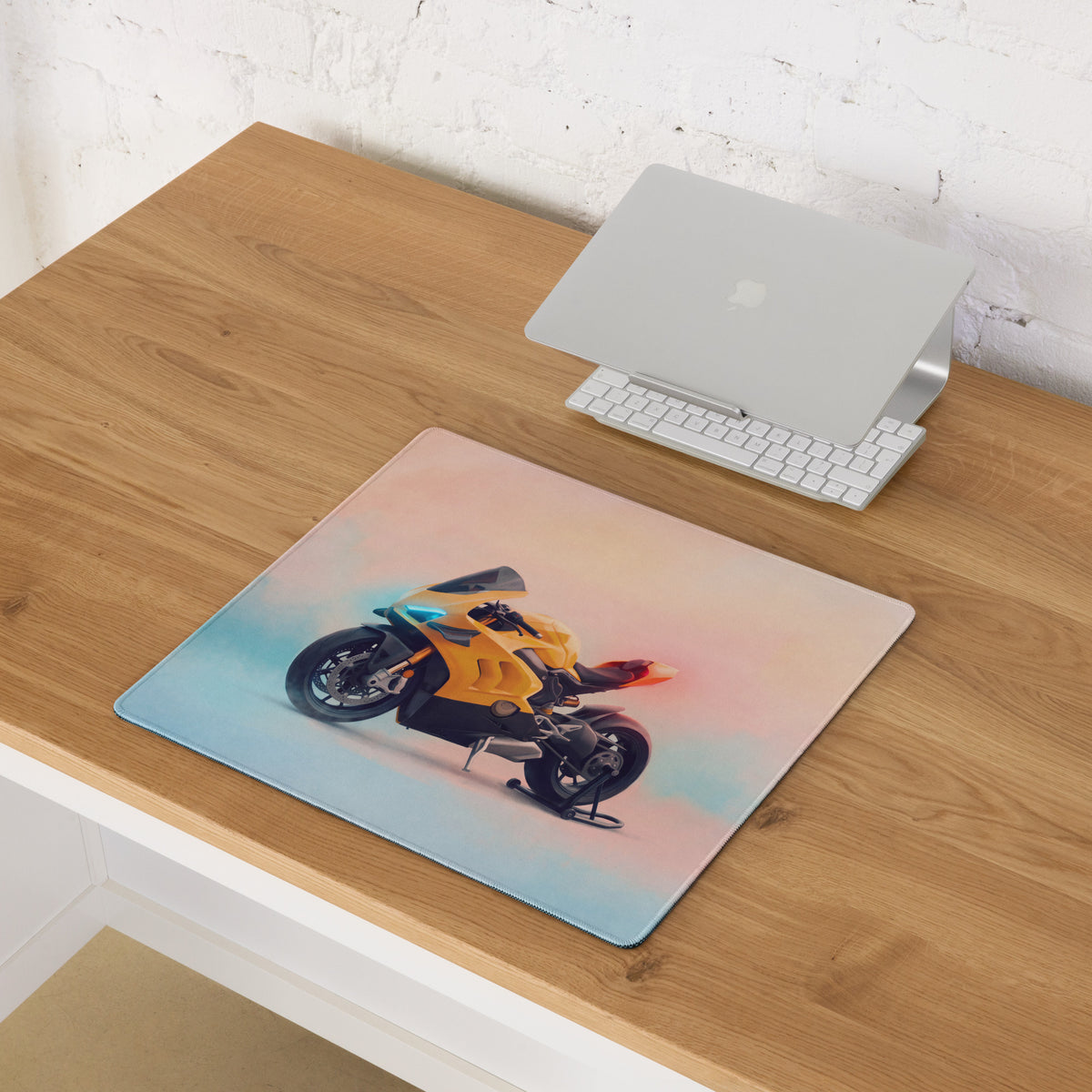 Yellow Ducati Panigale inspired large gaming desk mat with motorcycle graphic and blue pink gradient background mousepad