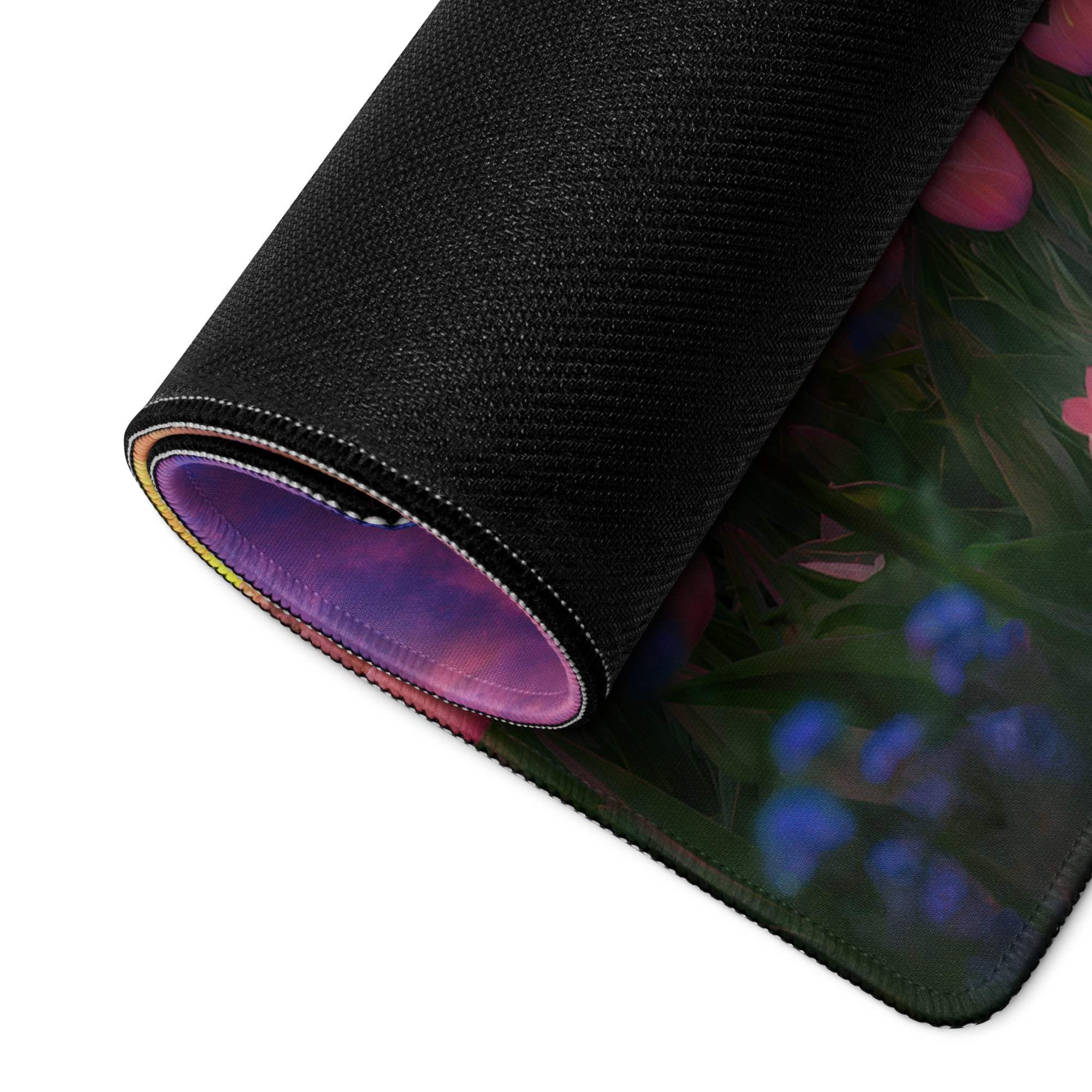 Black floral mousepad with purple pink blue flowers textured surface