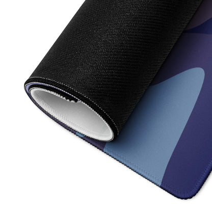 Rolled-up Calm Minimalist Majestic Mountain gaming mouse pad, blue tones