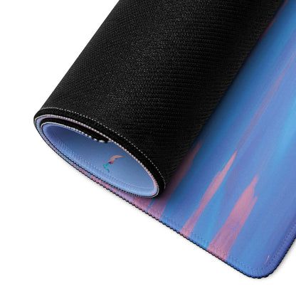 Rolled-up Dreamy Gaming Mouse Pad in pastel ocean sky blue-pink gradient with non-slip base
