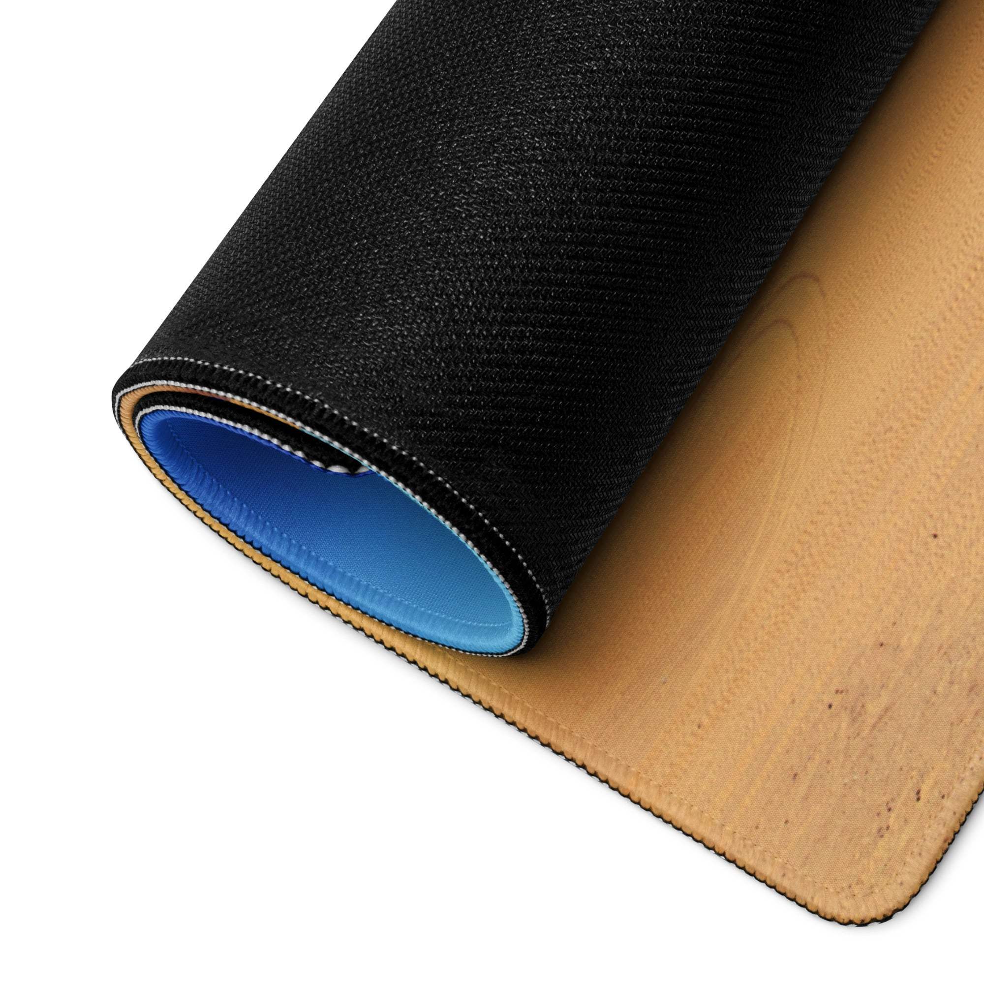 Desert Dunes Sunrise large mousepad back: black textured top, blue lining, tan cork backing