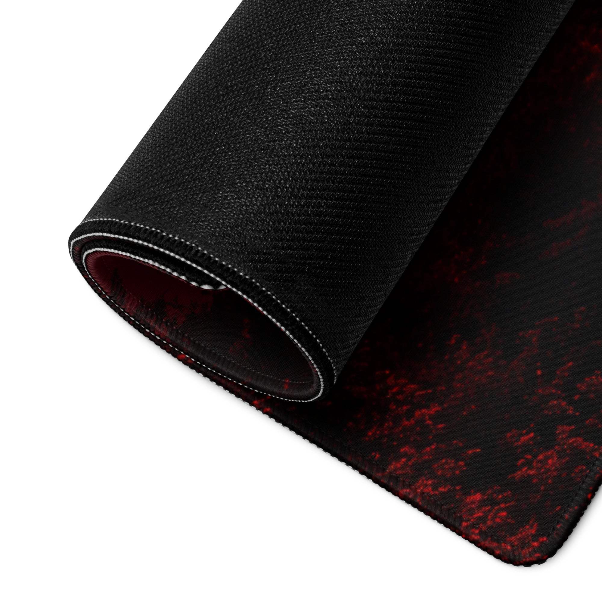 Backside of Dark Red Moon Forest large gaming mouse pad with black textured surface and red splatter non-slip backing