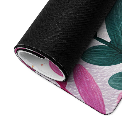 Rolled vibrant pink green botanical rug in black fabric for large gaming mouse pad