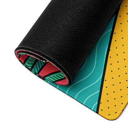 Pop art tropical sunset gaming mousepad rolled up with teal waves, yellow polka dots, non-slip backing and edge stitching