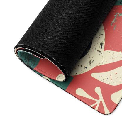 Vibrant floral abstract gaming mouse pad rolled up with non-slip base