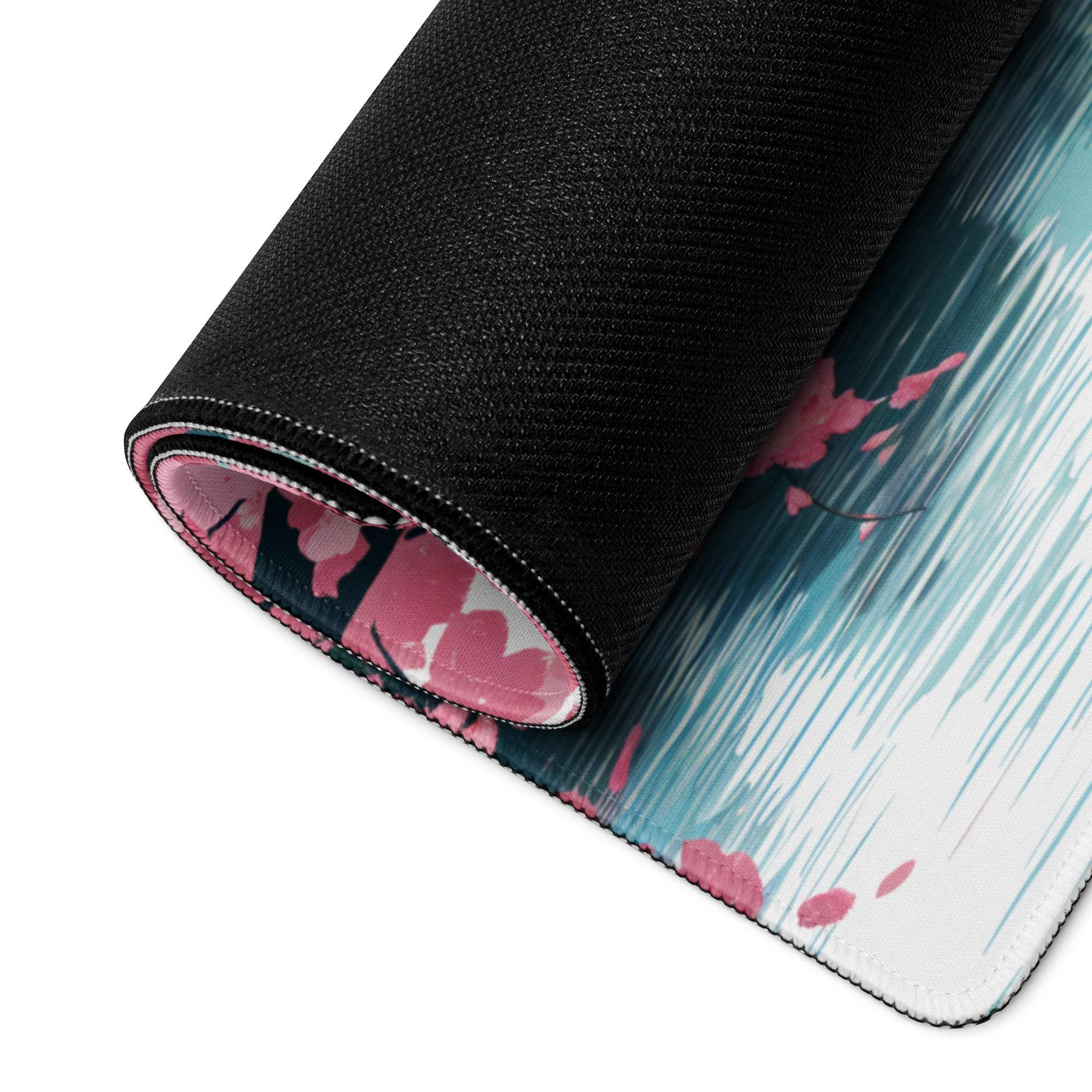 Elegant pastel pink cherry blossom gaming mouse pad rolled up