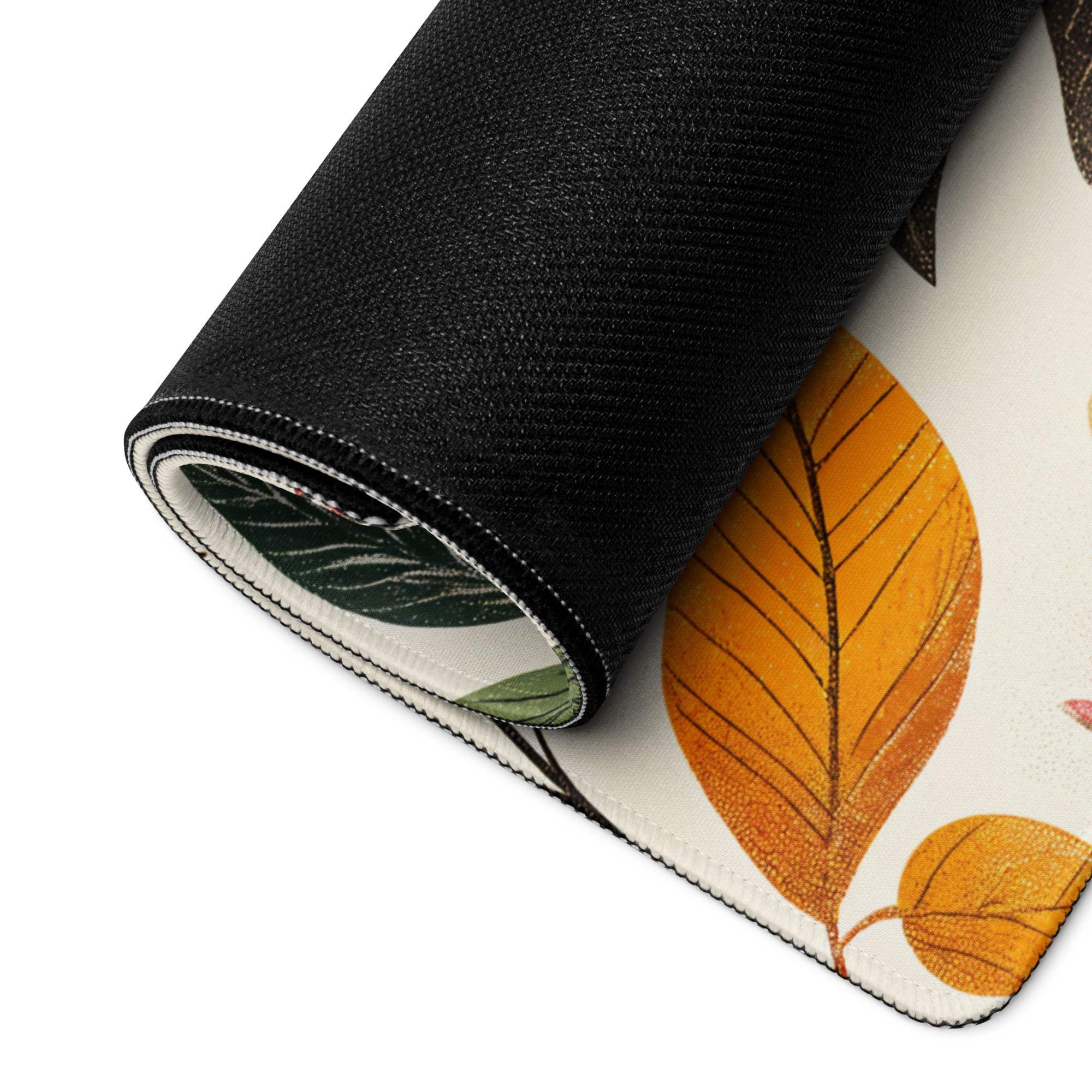 Rolled botanical autumn floral gaming mouse pad with orange green leaves