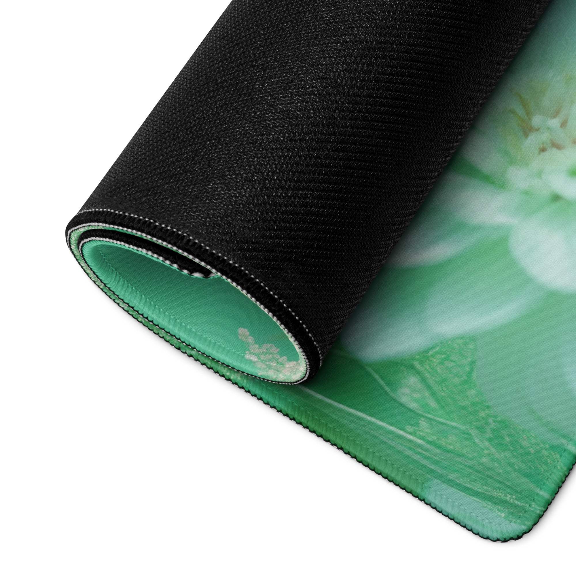 Rolled-up Floral Green Large Gaming Mouse Pad with teal lining