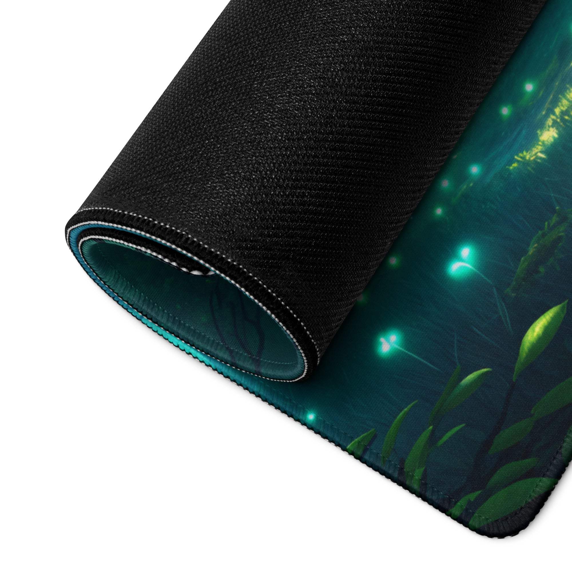 Rolled-up Fantasy Forest Glow gaming mouse pad with bioluminescent underwater scene