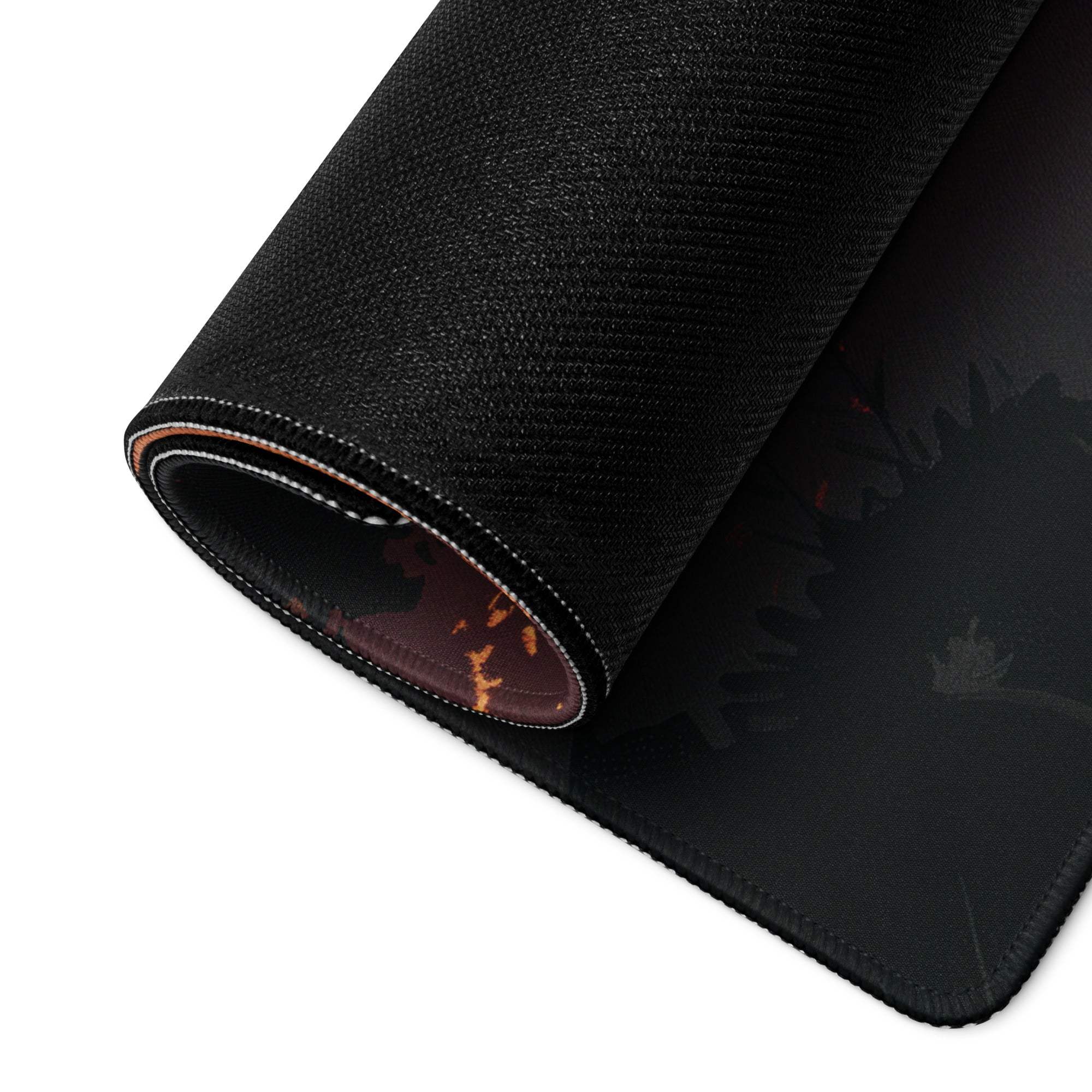 Back of Epic Sunset Forest Silhouette gaming mouse pad with black textured fiery underside