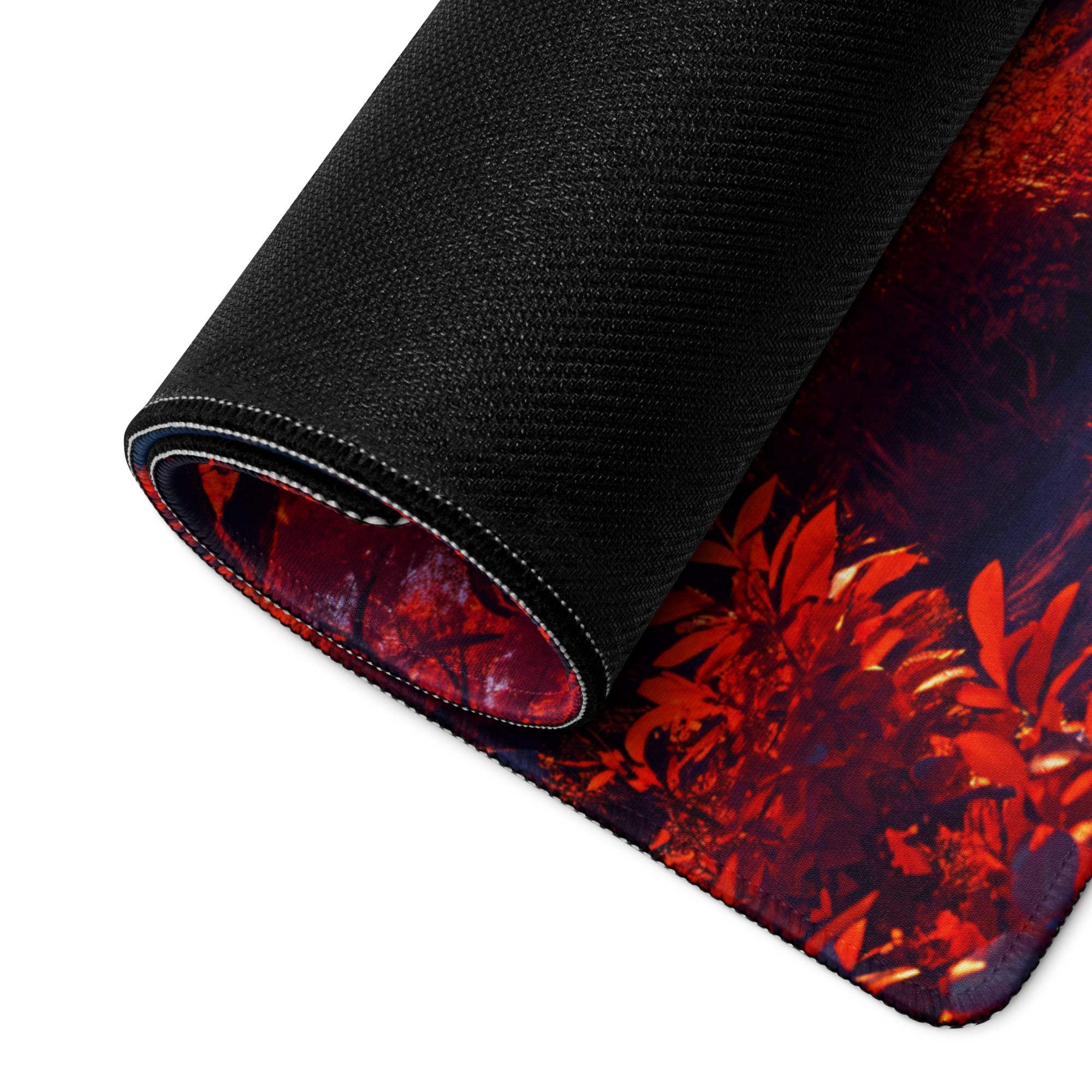 Black Vibrant Sunset Forest gaming mousepad with red orange leafy design
